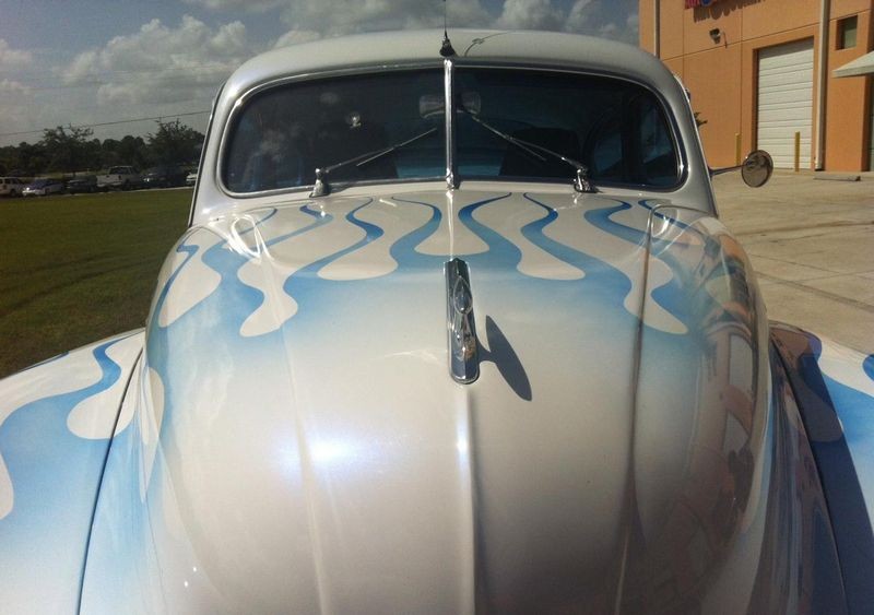 White paint job with blue flakes