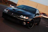 black GTO with new paint on hood.  Micro marring problems.-20-jpg