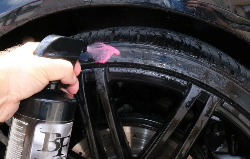 Now spray cleaner onto tire sidewall.