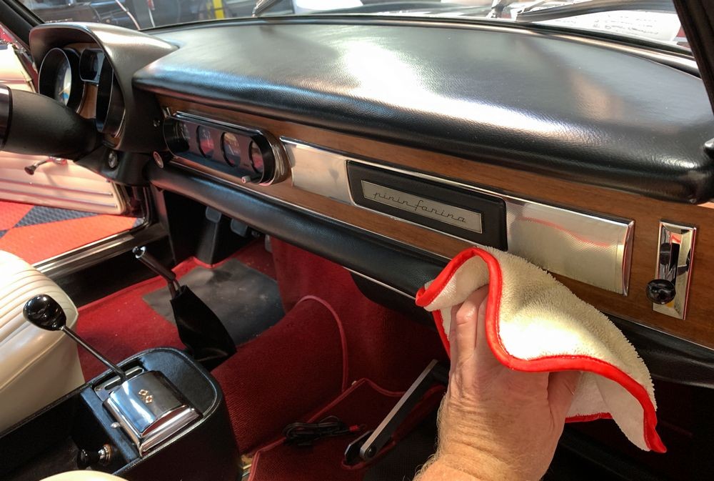 Applying Rejuvenator Oil to leather surfaces.