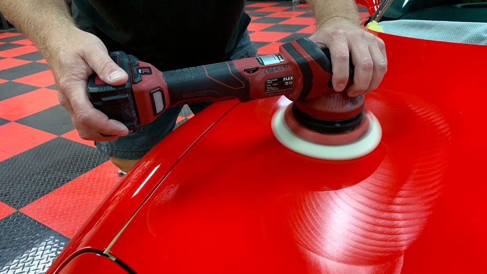Perfecting paint with Flex polisher before applying coating.