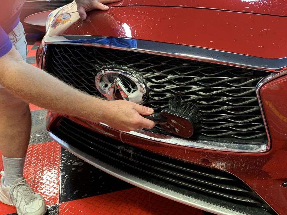 Use a boar's hair brush to clean the front grille.