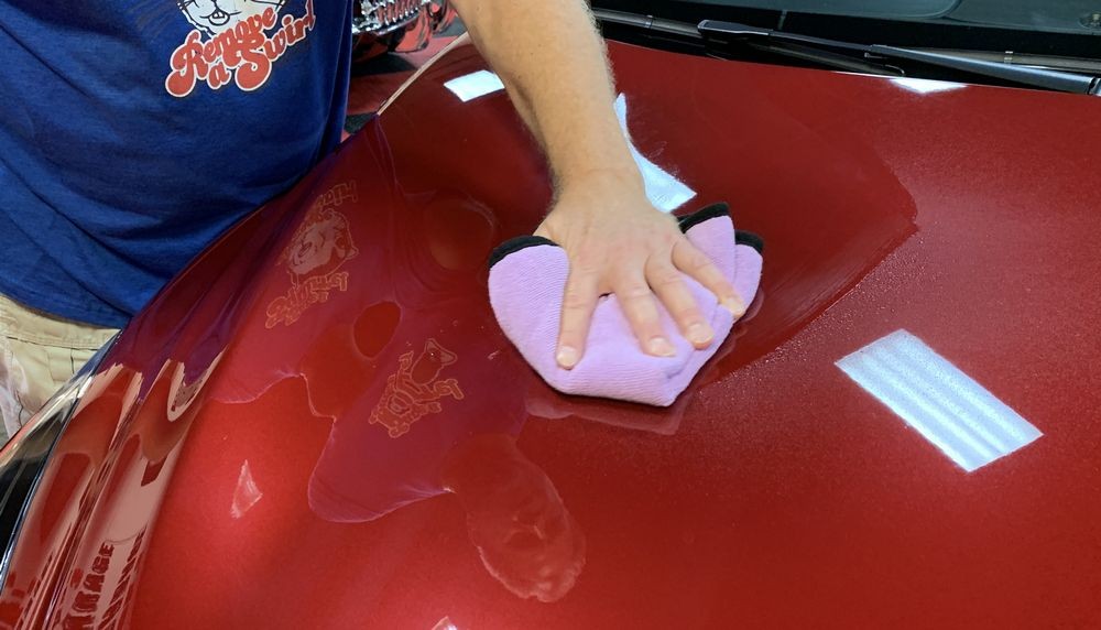 Using a clean, soft microfiber towel, spread the product over the surface.
